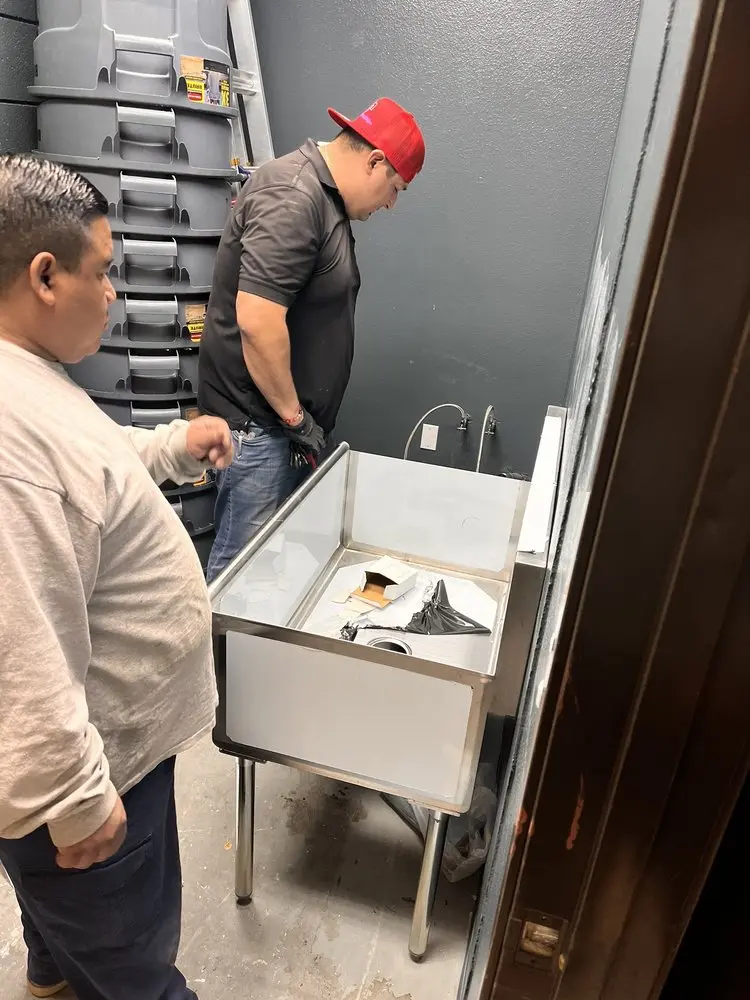Commercial plumbing and sink installation in Leonard